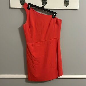 Fitted coral dress with skirt flap detail in front 
French connection